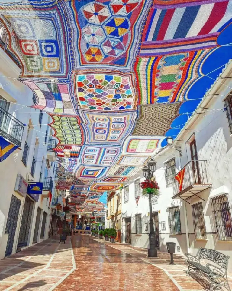 Unique And Colorful Sunshade Created By A Crochet Class In Spain 1