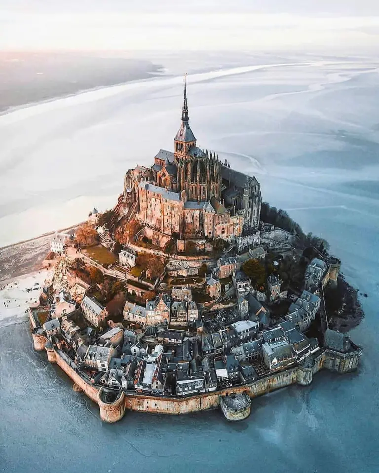 The Stunning 1,000-year-old Castle Rising From The Atlantic Ocean 16