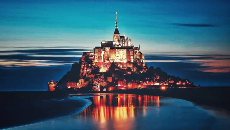 The Stunning 1,000-year-old Castle Rising From The Atlantic Ocean 19